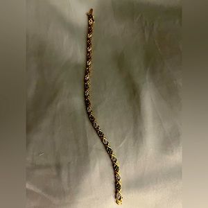 Diamond and emerald bracelet. 10k gold . Bought at peoples jewellers.